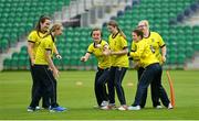 27 August 2023; Fox Lodge players warm-up before the Arachas Women's All-Ireland T20 Cup Final match between Merrion and Fox Lodge at Malahide Cricket Ground in Dublin. Photo by Seb Daly/Sportsfile