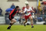 3 July 2004; Brian Dooher, Tyrone, in action against Sean Farrell, Down. Bank of Ireland Football Championship Qualifier, Round 2, Down v Tyrone, Pairc an Iuir, Newry, Co. Down. Picture credit; Damien Eagers / SPORTSFILE