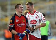 3 July 2004; Tyrone's Philip Jordan, left and Shane Sweeney share a joke as they leave the pitch after defeating Down. Bank of Ireland Football Championship Qualifier, Round 2, Down v Tyrone, Pairc an Iuir, Newry, Co. Down. Picture credit; Damien Eagers / SPORTSFILE