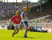 27 June 2004; Eoin Murphy, Waterford, in action against Joe Deane, Cork. Guinness Munster Senior Hurling Championship Final, Cork v Waterford, Semple Stadium, Thurles, Co. Tipperary. Picture credit; Pat Murphy / SPORTSFILE