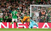 10 September 2023; Denzel Dumfries of Netherlands is tackled by Republic of Ireland goalkeeper Gavin Bazunu resulting in a penalty during the UEFA EURO 2024 Championship qualifying group B match between Republic of Ireland and Netherlands at the Aviva Stadium in Dublin. Photo by Stephen McCarthy/Sportsfile