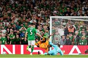 10 September 2023; Denzel Dumfries of Netherlands is tackled by Republic of Ireland goalkeeper Gavin Bazunu resulting in a penalty during the UEFA EURO 2024 Championship qualifying group B match between Republic of Ireland and Netherlands at the Aviva Stadium in Dublin. Photo by Stephen McCarthy/Sportsfile