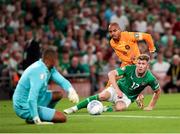 10 September 2023; Republic of Ireland goalkeeper Gavin Bazunu makes a save from Donyell Malen of Netherlands during the UEFA EURO 2024 Championship qualifying group B match between Republic of Ireland and Netherlands at the Aviva Stadium in Dublin. Photo by Michael P Ryan/Sportsfile