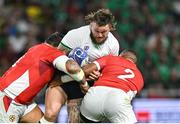 16 September 2023; Andrew Porter of Ireland is tackled by Ben Tameifuna, left, and Paula Ngauamo of Tonga during the 2023 Rugby World Cup Pool B match between Ireland and Tonga at Stade de la Beaujoire in Nantes, France. Photo by Brendan Moran/Sportsfile