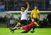 15 September 2023; Greg Sloggett of Dundalk is tackled by Ed McCarthy of Galway United during the Sports Direct Men’s FAI Cup quarter-final match between Galway United and Dundalk at Eamonn Deacy Park in Galway. Photo by Ben McShane/Sportsfile