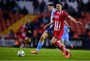 22 September 2023; Garry Buckley of Sligo Rovers in action against Cian Kavanagh of Derry City during the SSE Airtricity Men's Premier Division match between Sligo Rovers and Derry City at The Showgrounds in Sligo. Photo by Tyler Miller/Sportsfile