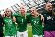 23 September 2023; Republic of Ireland players, from left, Abbie Larkin, Louise Quinn, Izzy Atkinson and Megan Walsh after the UEFA Women's Nations League B1 match between Republic of Ireland and Northern Ireland at Aviva Stadium in Dublin. Photo by Stephen McCarthy/Sportsfile