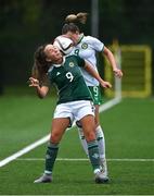 24 September 2023; Kascie Weir of Northern Ireland in action against Joy Ralph of Republic of Ireland during the Women's U19 international friendly match between Northern Ireland and Republic of Ireland at Blanchflower Stadium in Belfast. Photo by Ben McShane/Sportsfile