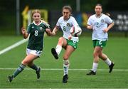 24 September 2023; Jess Fitzgerald of Republic of Ireland in action against Sophie Gargan of Northern Ireland during the Women's U19 international friendly match between Northern Ireland and Republic of Ireland at Blanchflower Stadium in Belfast. Photo by Ben McShane/Sportsfile