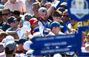 27 September 2023; Rory McIlroy of Europe signs autographs during a practice round before the 2023 Ryder Cup at Marco Simone Golf and Country Club in Rome, Italy. Photo by Ramsey Cardy/Sportsfile