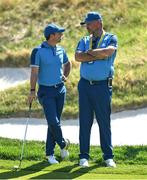 27 September 2023; Rory McIlroy of Europe, left, with Europe vice captain THomas Bjorn during a practice round before the 2023 Ryder Cup at Marco Simone Golf and Country Club in Rome, Italy. Photo by Brendan Moran/Sportsfile