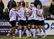 29 September 2023; Dundalk players celebrate after their side's first goal, scored by Paul Doyle, second from left, during the SSE Airtricity Men's Premier Division match between Dundalk and Drogheda United at Oriel Park in Dundalk, Louth. Photo by Ben McShane/Sportsfile