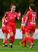 30 September 2023; Pearl Slattery of Shelbourne, left, celebrates with team-mate Megan Smyth-Lynch after scoring their side's first goal during the SSE Airtricity Women's Premier Division match between DLR Waves FC and Shelbourne FC at UCD Bowl in Dublin. Photo by Tyler Miller/Sportsfile