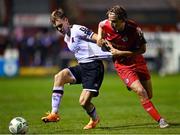 6 October 2023; Johannes Yli-Kokko of Dundalk is tackled by Harry Wood of Shelbourne during the SSE Airtricity Men's Premier Division match between Shelbourne and Dundalk at Tolka Park in Dublin. Photo by Stephen McCarthy/Sportsfile