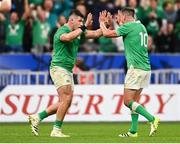 14 October 2023; Ireland players Dan Sheehan, left, and Jonathan Sexton celebrate their side's third try, a penalty try, in the 64th minute, during the 2023 Rugby World Cup quarter-final match between Ireland and New Zealand at the Stade de France in Paris, France. Photo by Harry Murphy/Sportsfile
