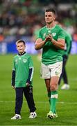 14 October 2023; Jonathan Sexton of Ireland with his son Luca after his side's defeat in the 2023 Rugby World Cup quarter-final match between Ireland and New Zealand at the Stade de France in Paris, France. Photo by Harry Murphy/Sportsfile