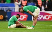 14 October 2023; Ireland players Finlay Bealham, right, and Bundee Aki after their side's defeat in the 2023 Rugby World Cup quarter-final match between Ireland and New Zealand at the Stade de France in Paris, France. Photo by Harry Murphy/Sportsfile