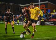 20 October 2023; Chris Forrester of St Patrick's Athletic in action against James Clarke of Bohemians during the SSE Airtricity Men's Premier Division match between Bohemians and St Patrick's Athletic at Dalymount Park in Dublin. Photo by Seb Daly/Sportsfile