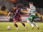 22 October 2023; Gary Deegan of Drogheda United in action against Markus Poom of Shamrock Rovers during the SSE Airtricity Men's Premier Division match between Shamrock Rovers and Drogheda United at Tallaght Stadium in Dublin. Photo by Stephen McCarthy/Sportsfile