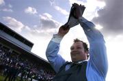 11 July 2004; Pat Dolan, Cork City manager, celebrates at the end of the game after victory over NEC Nijmegen. Intertoto Cup, Second round, Second leg, Cork City v NEC Nijmegen, Turners Cross, Cork. Picture credit; David Maher / SPORTSFILE