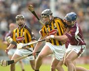 11 July 2004; Derek Lyng, Kilkenny, in action against David Forde, Galway. Guinness Senior Hurling Championship Qualifier, Round 3, Galway v Kilkenny, Semple Stadium, Thurles, Co. Tipperary. Picture credit; Pat Murphy / SPORTSFILE