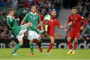 6 September 2013; Oliver Norwood, Northern Ireland, in action against Raul Meireles, Portugal. 2014 FIFA World Cup Qualifier, Group F, Northern Ireland v Portugal, Windsor Park, Belfast.  Picture credit: Oliver McVeigh / SPORTSFILE