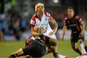 6 September 2013; Luke Marshall, Ulster, is tackled by Tom Prydie, Newport Gwent Dragons. Celtic League 2013/14, Round 1, Newport Gwent Dragons v Ulster, Rodney Parade, Wales. Picture credit: Steve Pope / SPORTSFILE