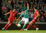 6 September 2013; Martin Paterson, Northern Ireland, in action against Bruno Alves, left, and Pepe, Portugal. 2014 FIFA World Cup Qualifier, Group F, Northern Ireland v Portugal, Windsor Park, Belfast.  Picture credit: Oliver McVeigh / SPORTSFILE