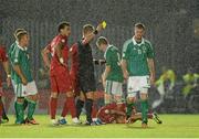 6 September 2013; Chris Brunt, Northern Ireland, is shown his second yellow card by referee Danny Makkelie and subsequently sent off. 2014 FIFA World Cup Qualifier, Group F, Northern Ireland v Portugal, Windsor Park, Belfast.  Picture credit: Oliver McVeigh / SPORTSFILE