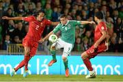 6 September 2013; Martin Paterson, Northern Ireland, in action against Bruno Alves, left, and Pepe, Portugal. 2014 FIFA World Cup Qualifier, Group F, Northern Ireland v Portugal, Windsor Park, Belfast.  Picture credit: Oliver McVeigh / SPORTSFILE