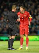 6 September 2013; Referee Danny Makkelie speaking to Christano Ronaldo, Portugal, after showing him a yellow card. 2014 FIFA World Cup Qualifier, Group F, Northern Ireland v Portugal, Windsor Park, Belfast.  Picture credit: Oliver McVeigh / SPORTSFILE