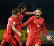 6 September 2013; Bruno Alves, Portugal, centre, celebrates with Vieirinha and Miguel after scoring his side's first goal. 2014 FIFA World Cup Qualifier, Group F, Northern Ireland v Portugal, Windsor Park, Belfast.  Picture credit: Oliver McVeigh / SPORTSFILE