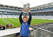 7 September 2013; On the eve of the All-Ireland Hurling Final, Clare hurling legend Jamesie O’Connor gave a unique tour of Croke Park stadium as part of the Bord Gáis Energy Legends Tour Series. Pictured holding the Liam MacCarthy Cup at the tour is Ciarán Jones, aged 11, from Ennis, Co. Clare. The Final Bord Gáis Energy Legends Tour of the year will take place on Saturday, 21st September and will feature former Mayo player, Willie Joe Padden. Full details are available on www.crokepark.ie/events. Croke Park, Dublin. Picture credit: Barry Cregg / SPORTSFILE