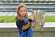 7 September 2013; On the eve of the All-Ireland Hurling Final, Clare hurling legend Jamesie O’Connor gave a unique tour of Croke Park stadium as part of the Bord Gáis Energy Legends Tour Series. Pictured holding the Liam MacCarthy Cup at the tour is Aíne Jones, aged 8, from Ennis, Co. Clare. The Final Bord Gáis Energy Legends Tour of the year will take place on Saturday, 21st September and will feature former Mayo player, Willie Joe Padden. Full details are available on www.crokepark.ie/events. Croke Park, Dublin. Picture credit: Barry Cregg / SPORTSFILE