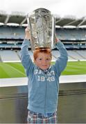 7 September 2013; On the eve of the All-Ireland Hurling Final, Clare hurling legend Jamesie O’Connor gave a unique tour of Croke Park stadium as part of the Bord Gáis Energy Legends Tour Series. Pictured holding the Liam MacCarthy Cup at the tour is Tommy McNamara, aged 7, from Ennis, Co. Clare. The Final Bord Gáis Energy Legends Tour of the year will take place on Saturday, 21st September and will feature former Mayo player, Willie Joe Padden. Full details are available on www.crokepark.ie/events. Croke Park, Dublin. Picture credit: Barry Cregg / SPORTSFILE