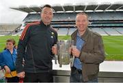 7 September 2013; On the eve of the All-Ireland Hurling Final, Clare hurling legend Jamesie O’Connor gave a unique tour of Croke Park stadium as part of the Bord Gáis Energy Legends Tour Series. Pictured holding the Liam MacCarthy Cup at the tour is Flor O'Sullivan, from Rosscarbery, Co. Cork and Jamesie O’Connor. The Final Bord Gáis Energy Legends Tour of the year will take place on Saturday, 21st September and will feature former Mayo player, Willie Joe Padden. Full details are available on www.crokepark.ie/events. Croke Park, Dublin. Picture credit: Barry Cregg / SPORTSFILE