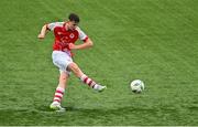 29 October 2023; Finn Duffy of St Patrick Athletic scoring his side's first goal during the EA SPORTS U14 LOI Eddie Wallace Cup match between Shamrock Rovers and St Patrick Athletic at Athlone Town Stadium in Westmeath. Photo by Eóin Noonan/Sportsfile