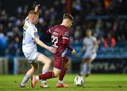 3 November 2023; Aaron McNally of Drogheda United in action against Shane Farrell of Shelbourne during the SSE Airtricity Men's Premier Division match between Drogheda United and Shelbourne at Weaver's Park in Drogheda, Louth. Photo by Piaras Ó Mídheach/Sportsfile
