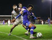 4 November 2023; Derik Osede of Waterford in action against Jack Doherty of Cobh Ramblers during the SSE Airtricity Men's First Division Play-Off Final between Waterford and Cobh Ramblers at Turner's Cross in Cork. Photo by Michael P Ryan/Sportsfile