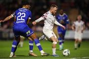 4 November 2023; Jack Doherty of Cobh Ramblers in action against Giles Phillips of Waterford during the SSE Airtricity Men's First Division Play-Off Final between Waterford and Cobh Ramblers at Turner's Cross in Cork. Photo by Michael P Ryan/Sportsfile