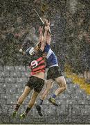 5 November 2023; Daniel Hogan of Sarsfields in action against Paddy Leavey of Ballygunner during the AIB Munster GAA Hurling Senior Club Championship quarter-final match between Ballygunner and Sarsfields at Walsh Park in Waterford. Photo by Eóin Noonan/Sportsfile