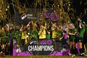 11 November 2023; Peamount United players celebrate with the SSE Airtricity Women's Premier Division trophy after the SSE Airtricity Women's Premier Division match between Peamount United and Sligo Rovers at PRL Park in Greenogue, Dublin. Photo by Stephen McCarthy/Sportsfile