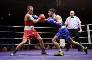 11 November 2023; Dean Walsh of St Ibars/St Josephs Boxing Club, Wexford, left, and Eugene McKeever of Holy Family Drogheda Boxing Club, Louth, during their light middleweight 71kg final bout at the IABA National Elite Boxing Championships 2024 Finals at the National Boxing Stadium in Dublin. Photo by Seb Daly/Sportsfile