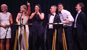 11 November 2023; Attendees, from left, Sarah Lavin, Erin King, Marian Heffernan, Rob Heffernan, Jordan Conroy, and Noel Hendricks on stage at the Team Ireland Olympic Ball at the Mansion House in Dublin. The event was a joint celebration of the brilliant performances of Team Ireland athletes at the European Games this summer, as well as the announcement of the winners of the Olympic Federation of Ireland Annual Awards. The event was attended by the Minister for Tourism, Culture, Arts, Gaeltacht, Sport and Media, Catherine Martin TD, Minister of State for Sport and Physical Education, Thomas Byrne TD, Olympic medallists, European Games athletes, Team Ireland Sponsors and Partners, Sport Ireland and the wider Olympic family. Photo by David Fitzgerald/Sportsfile