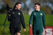 15 November 2023; Dara O'Shea and Matthew Turnbull, FAI multimedia executive, during a Republic of Ireland training session at the FAI National Training Centre in Abbotstown, Dublin. Photo by Stephen McCarthy/Sportsfile