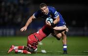 18 November 2023; Scott Penny of Leinster is tackled by Archie Hughes of Scarlets during the United Rugby Championship match between Leinster and Scarlets at the RDS Arena in Dublin. Photo by Harry Murphy/Sportsfile