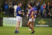 19 November 2023; Craig Dias of Kilmacud Crokes shakes hands with Robert Leavy of Ardee St Mary’s after the AIB Leinster GAA Football Senior Club Championship Semi-Final match between Ardee St Mary's, Louth, and Kilmacud Crokes, Dublin, at Pairc Mhuire in Ardee, Louth. Photo by Daire Brennan/Sportsfile
