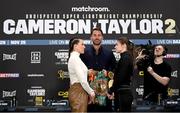 23 November 2023; Chantelle Cameron and Katie Taylor square-off, in the company of promoter Eddie Hearn, during a press conference at the Dublin Royal Convention Centre ahead of their super lightweight championship fight, on November 25th at 3Arena in Dublin. Photo by Stephen McCarthy/Sportsfile