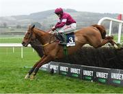 25 November 2023; Idas Boy, with Sam Ewing up, jumps the last on their way to winning the Ryans Cleaning Handicap Steeplechase on day one of the Punchestown Winter Festival at Punchestown Racecourse in Kildare. Photo by Matt Browne/Sportsfile