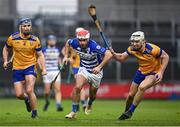 25 November 2023; Ferran O'Sullivan of Naas in action against Liam Rushe of Na Fianna during the AIB Leinster GAA Hurling Senior Club Championship semi-final match between Naas, Kildare, and Na Fianna, Dublin, at Laois Hire O’Moore Park in Portlaoise, Laois. Photo by Eóin Noonan/Sportsfile